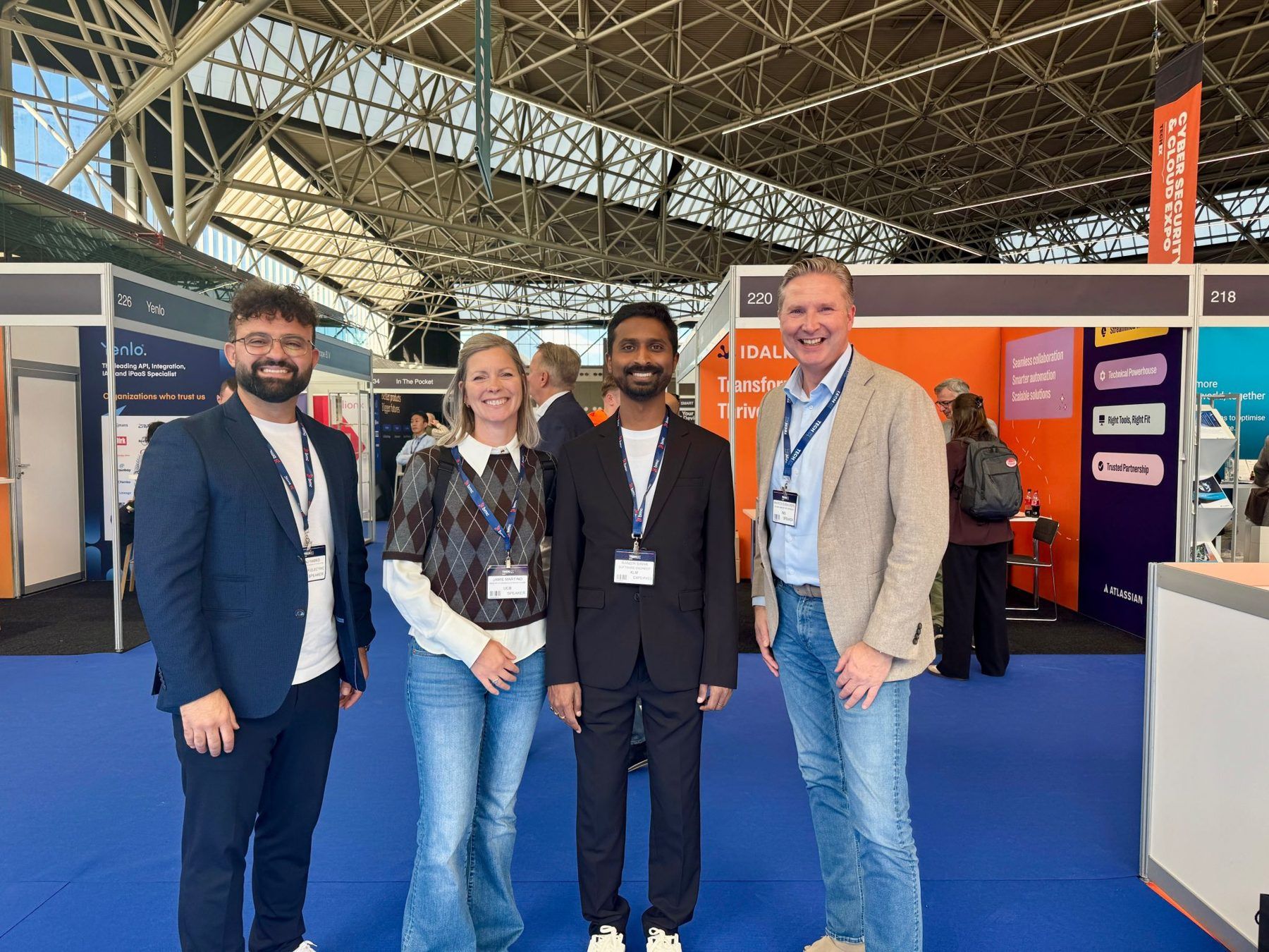 Amanj Hamid with fellow speakers on the expo floor at TechEx Europe 2025