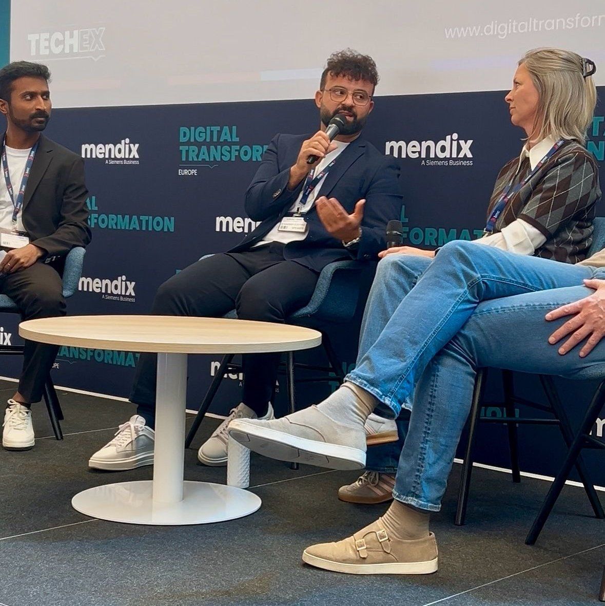 Amanj Hamid speaking on the panel at TechEx Europe 2025